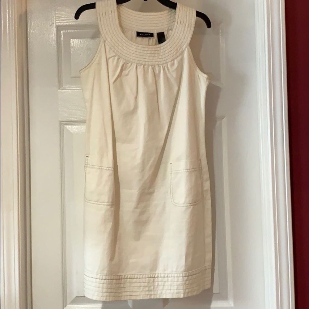 Off White Dress with pockets.